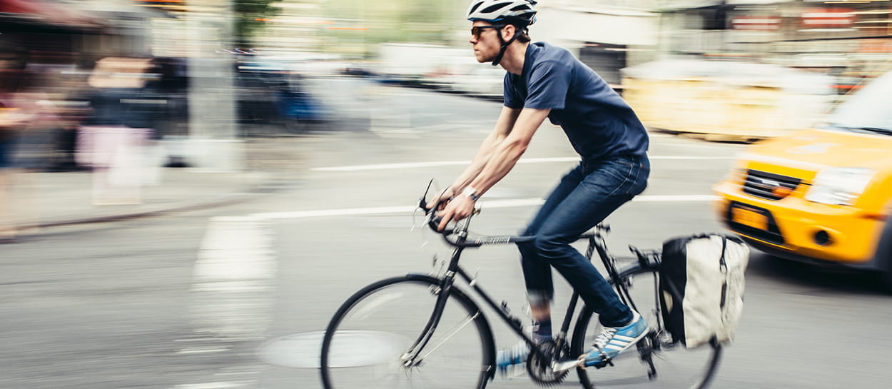 Person riding a bike on a city street