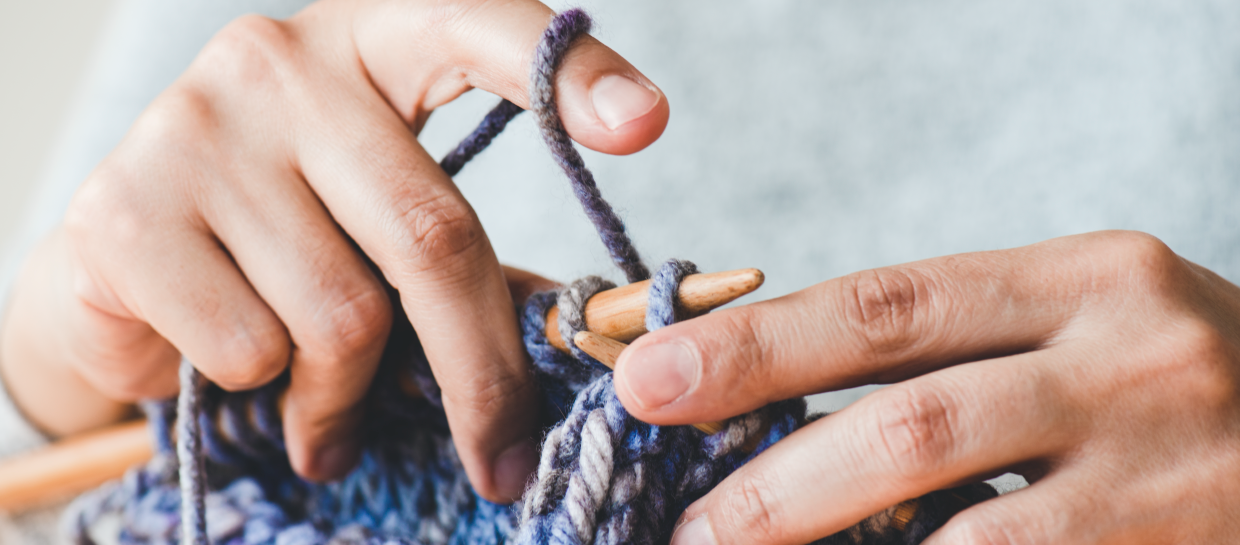 Close up of hands knitting