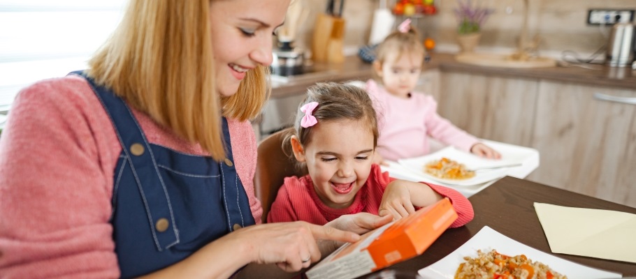 Mother and daughter cooking in the kitchen