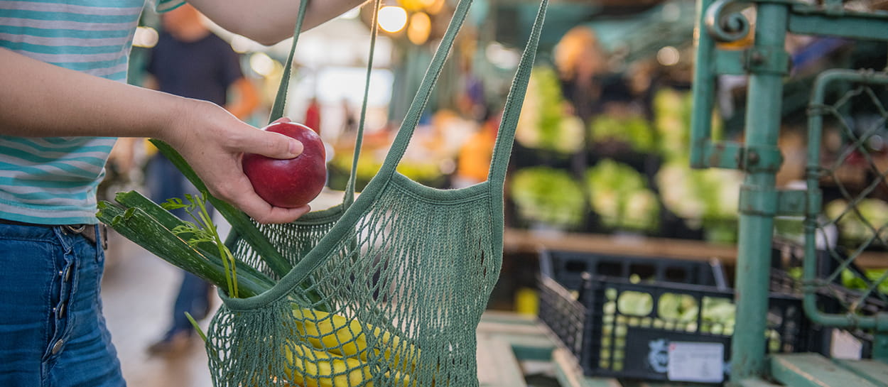 Woman shopping with reusable bag